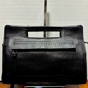 Coach Bleecher Leather Clutch.